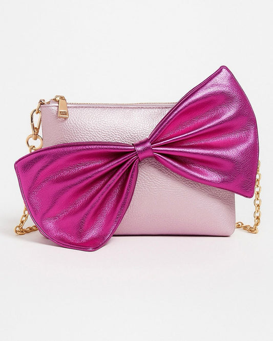 Bolso Clutch Rosa Metálico con Lazo Grande – Elegancia y Estilo Glam