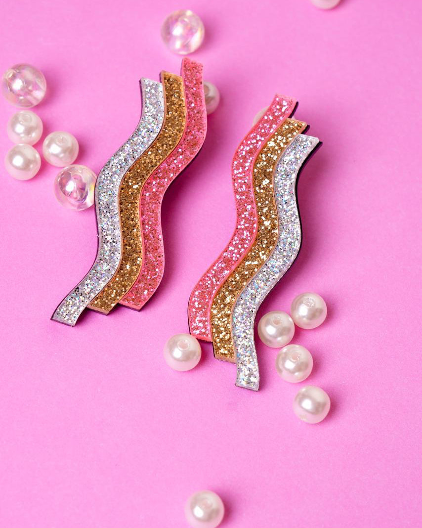 Aros Brillantina - Joyería de Moda con Brillo y Estilo Juvenil